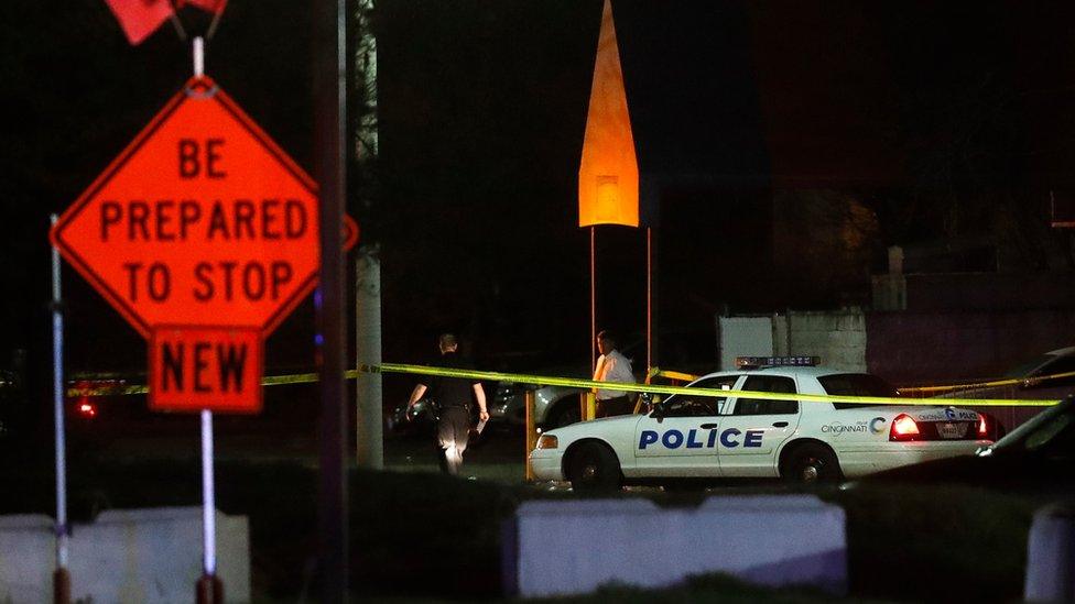 Police operate at a crime scene outside the Cameo Nightclub after a reported fatal shooting, Sunday, March 26, 2017, in Cincinnati.