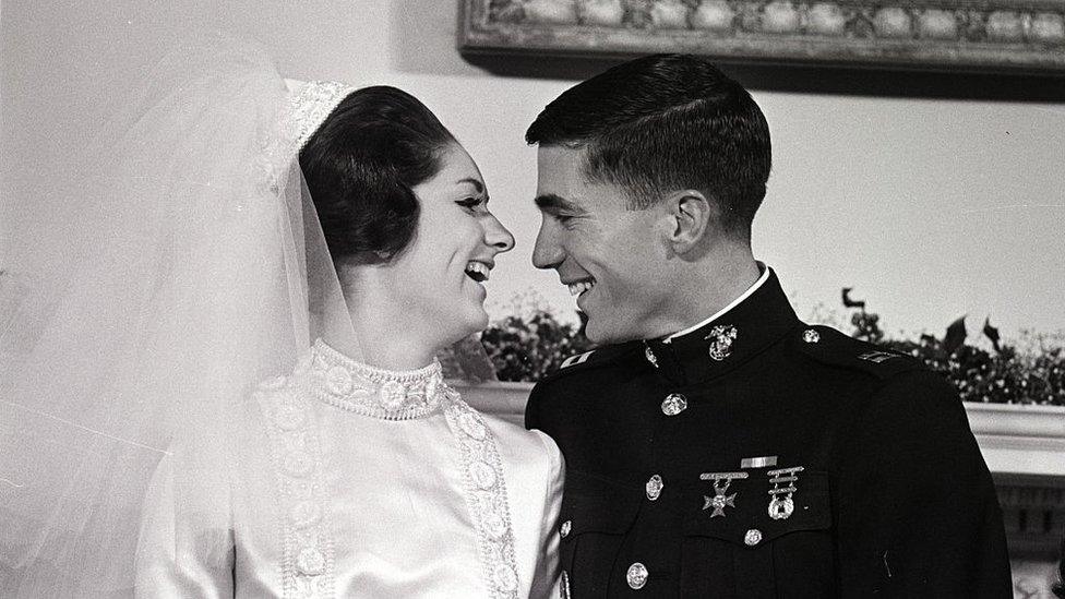 Newlyweds Charles Robb and Lynda Johnson are the picture of happiness as they pose in the Yellow Oval Room of the White House today