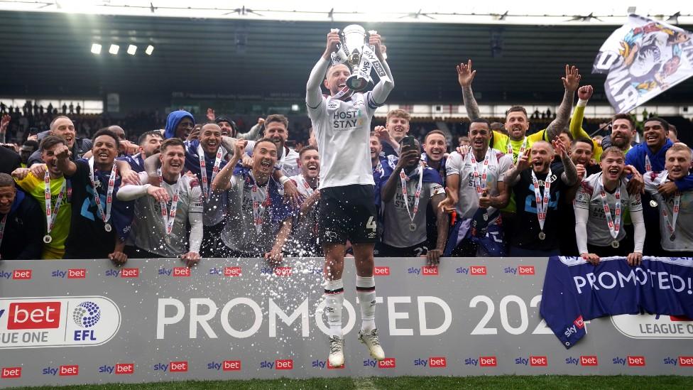 Derby County celebrate promotion to the Championship in 2024