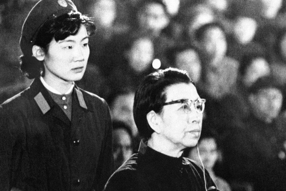 Mao Zedong's widow Jiang Qing sits in the defendant's box during her trial for crimes committed during the Cultural Revolution, on 5 December 1980