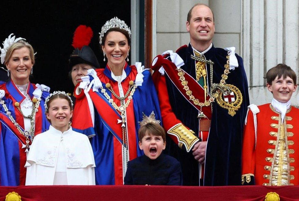 Princess Charlotte and Prince Louis with their parents the Prince and Princess of Wales, with the Duchess of Edinburgh, Sophie, and Anne, the Princess Royal, behind them