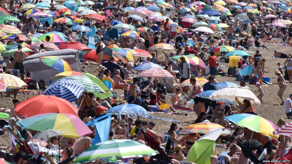 People on an English beach in summer