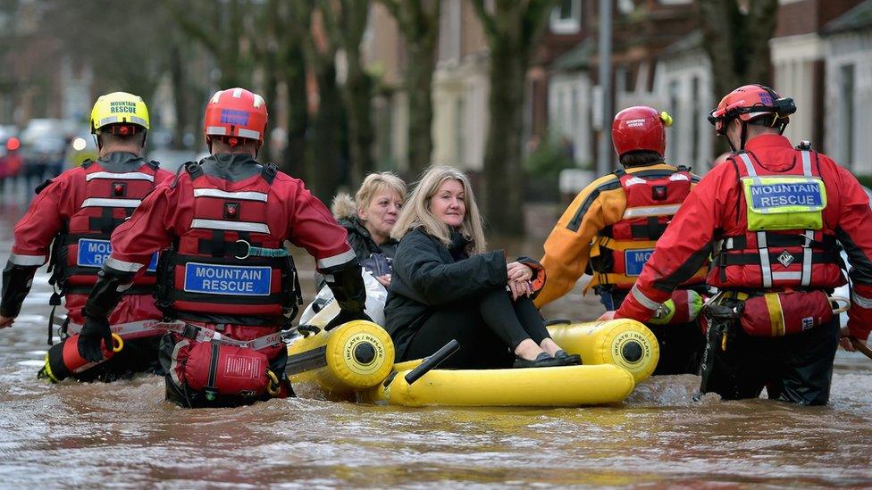 Women being evacuated in Carlisle