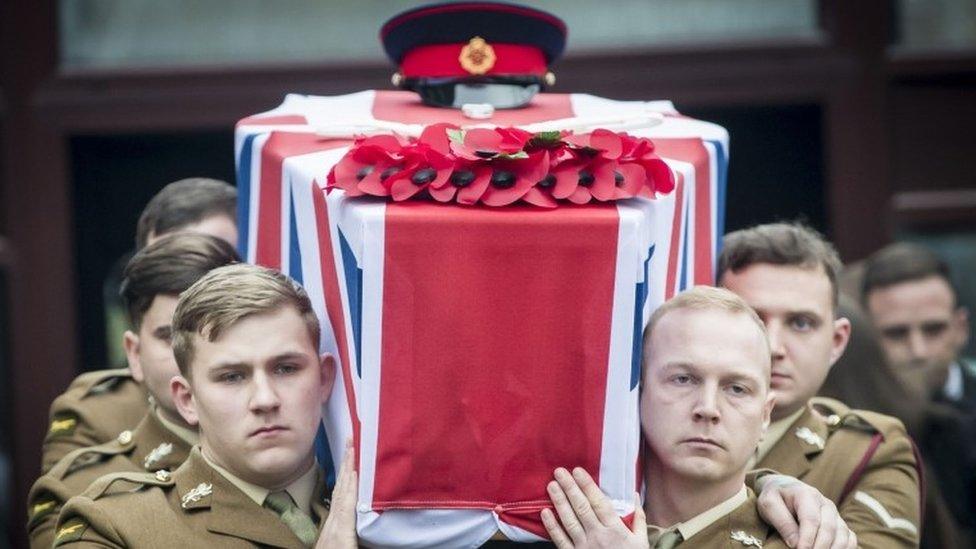 The coffin for Lance Corporal Scott Hetherington is carried from All Saints and Martyrs Church in Middleton, Greater Manchester following a Military funeral.