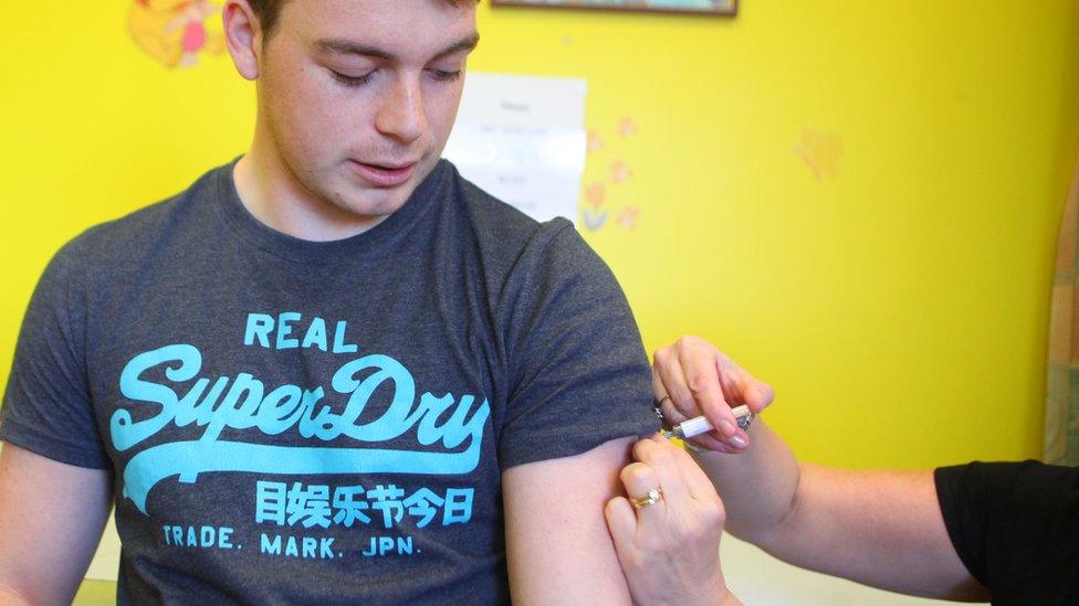 student receiving injection