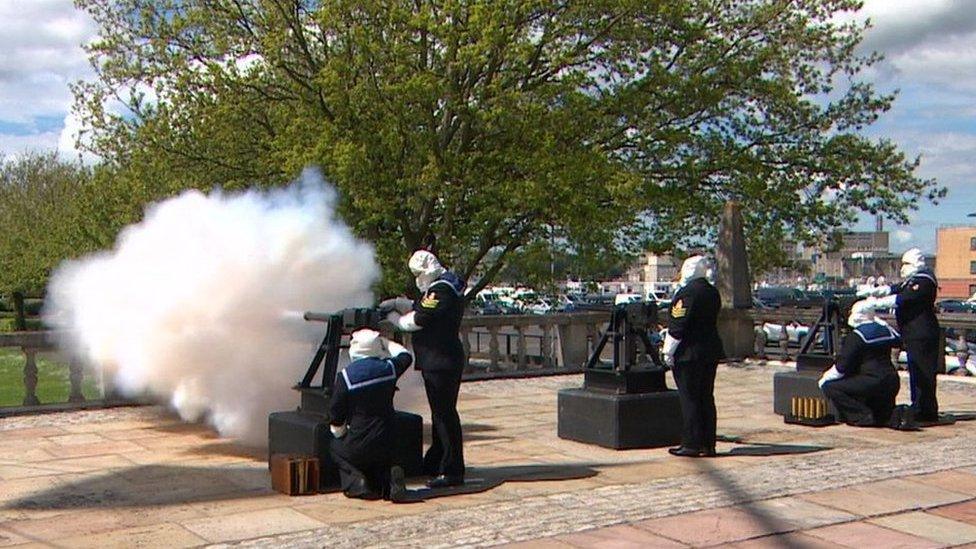 A 21-round gun salute at HMS Drake on Coronation Day, 2024