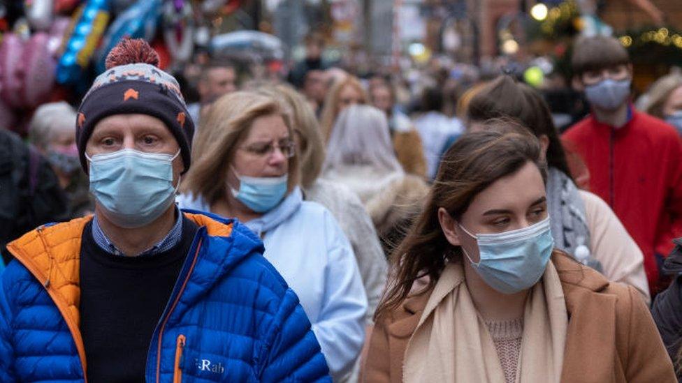 Shoppers in masks