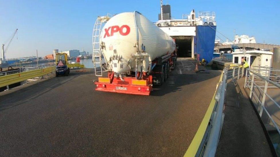 Lorry driving on to ferry