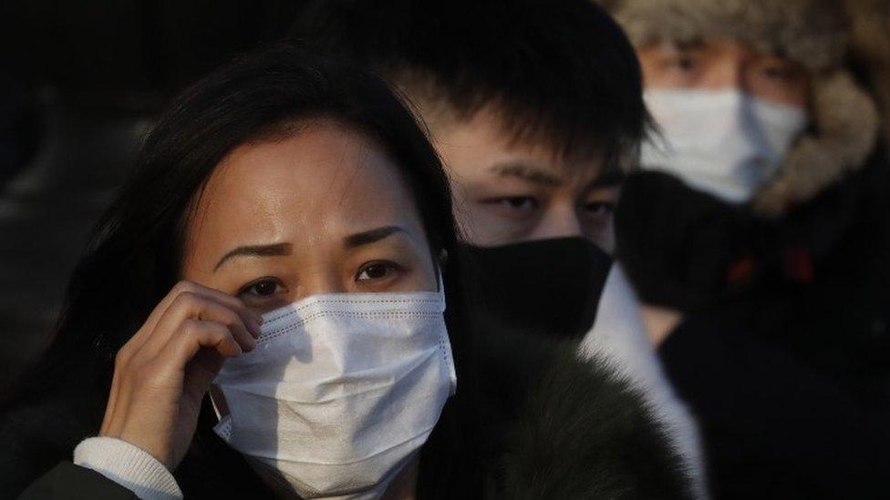 People wearing masks in Russia