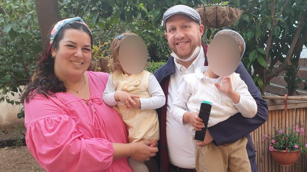 Tova Levy poses with her family.