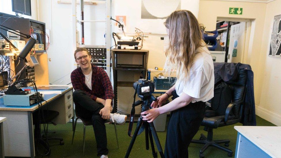 Floating points being interviewed by a student