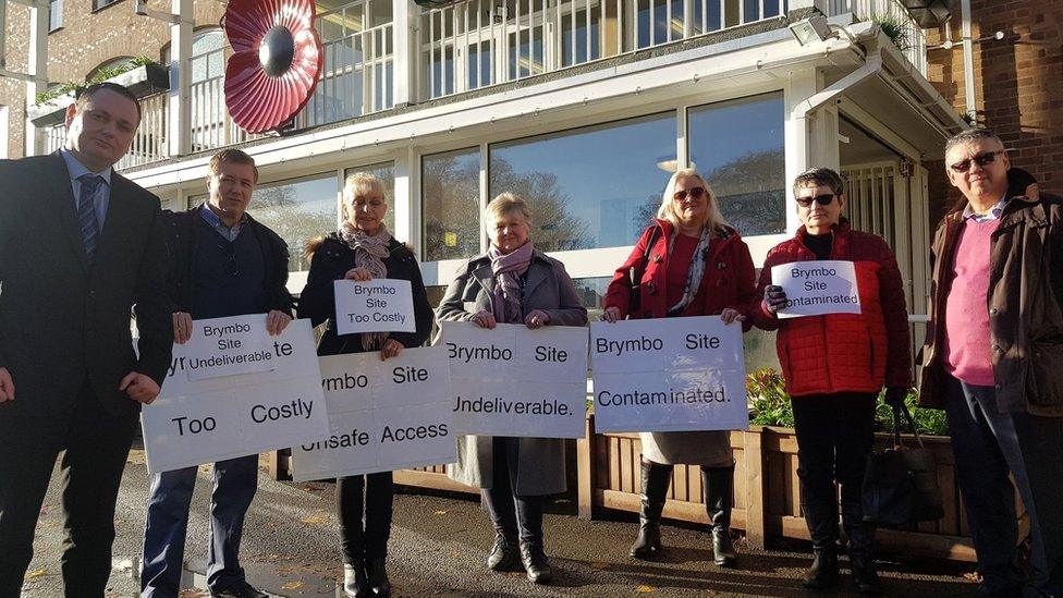 Protesters against a proposed gypsy and traveller site in Brymbo gather outside Wrexham's Guildhall