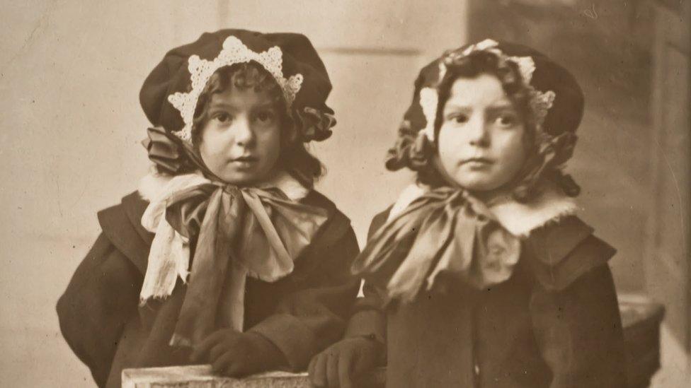 Archive photo of children wearing matching outfits