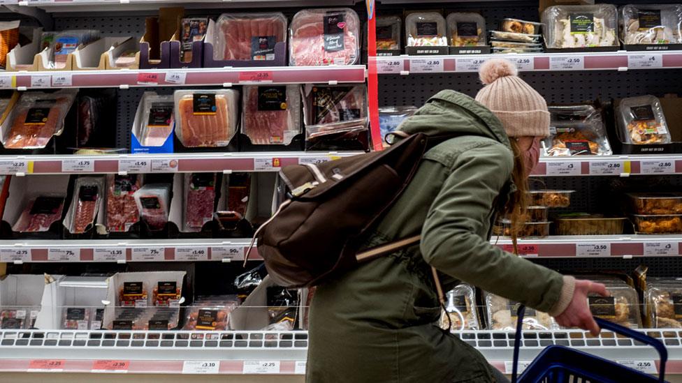 A shopper in Sainsburys