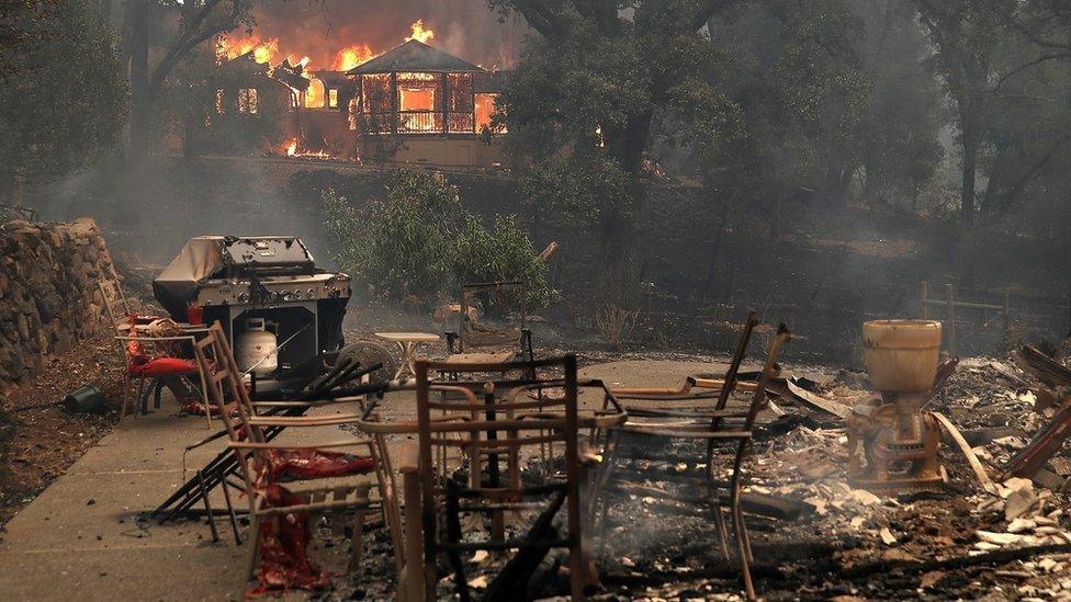 Fire consumes a home as out of control wildfires move through the area on October 9, 2017 in Glen Ellen, California