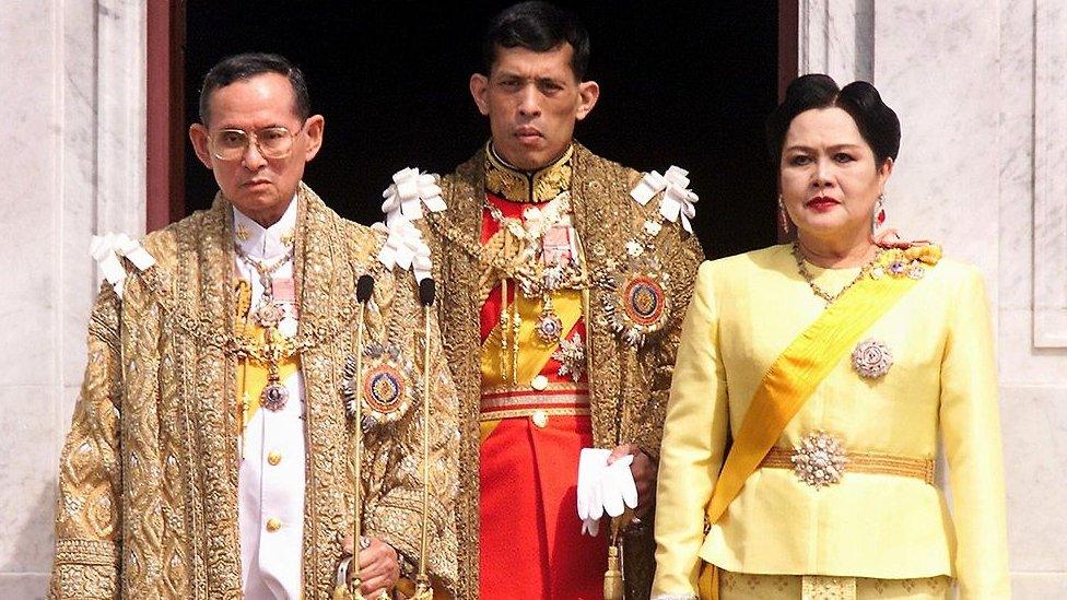 The Thai royal family, (L to R) The late Bhumibol Adulyadej, King Maha Vajiralongkorn & Queen Sirikit, 1999