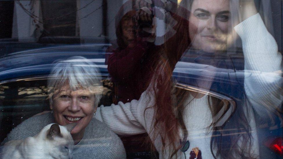 Family at a window