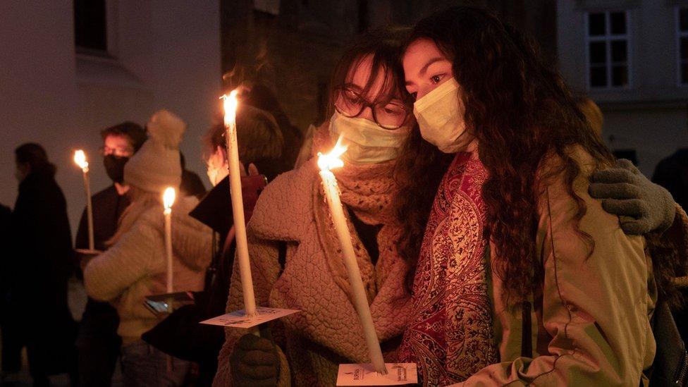 People attend a candlelight vigil remembering the victims of the terrorist attack in Vienna, Austria on November 5, 2020