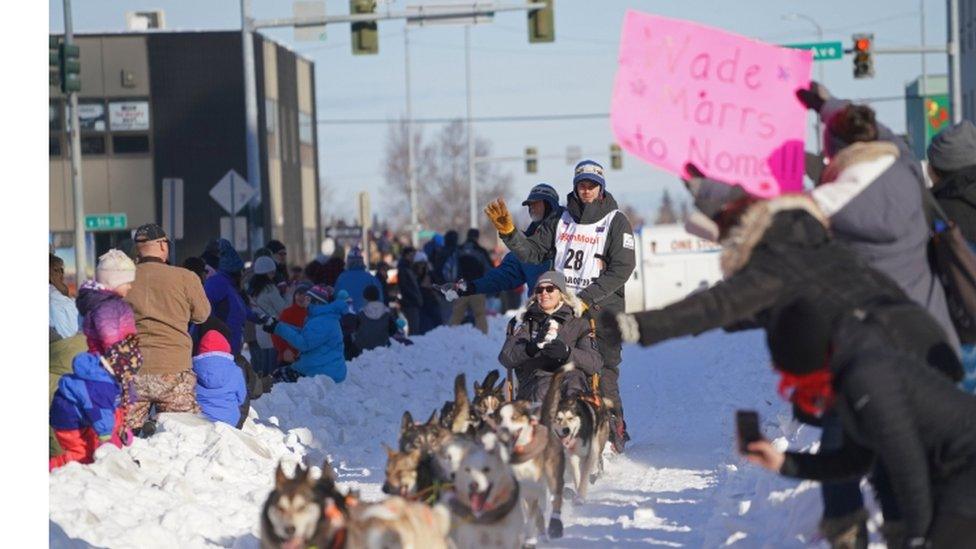 Reigning winner Joar Leifseth Ulsom rides through Anchorage