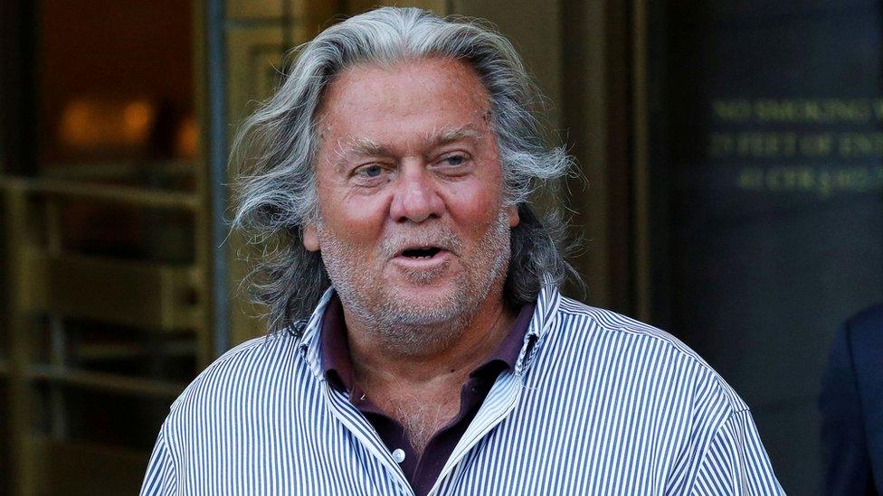 Steve Bannon, dressed in a pinstripe shirt