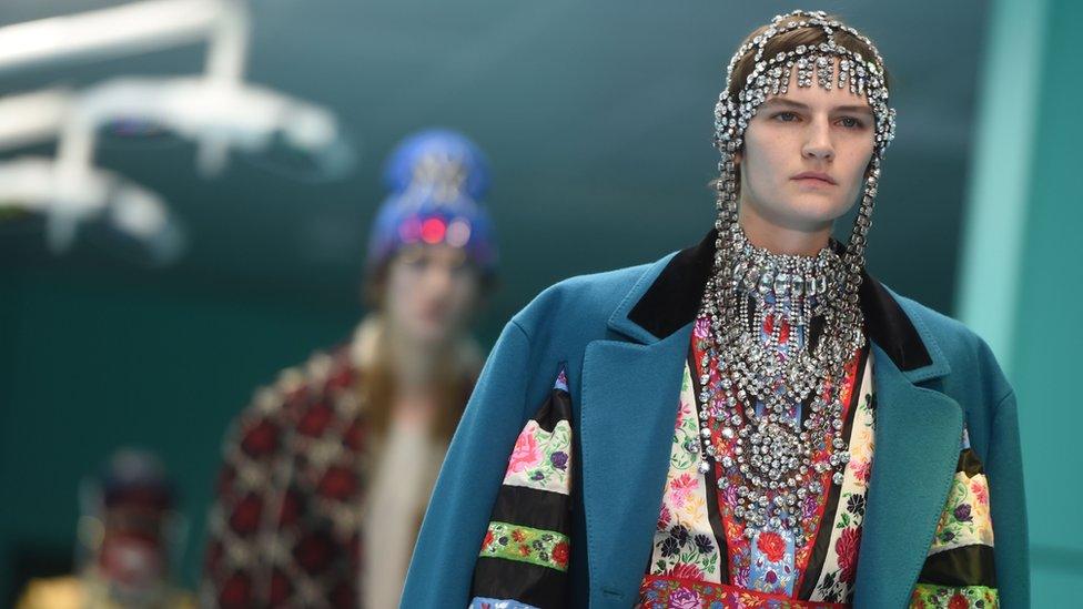 Models on the catwalk during Milan Fashion Week