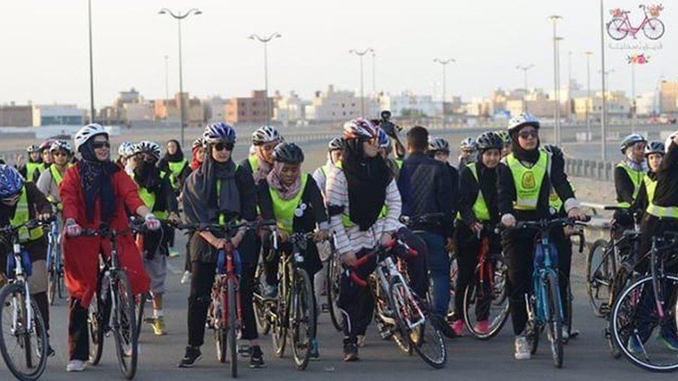 Women cyclists at the starting line of the first ever cycle race