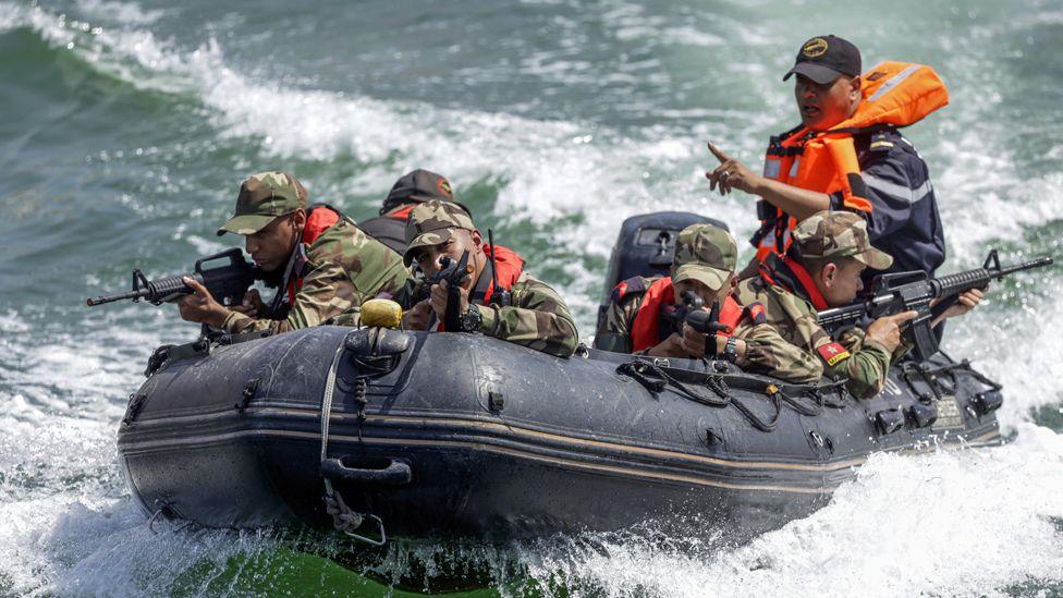 Members of Morocco's military in a rubber dingy simulate securing the port during the joint multinational African Lion 2025 war games in Agadir - May 2025.