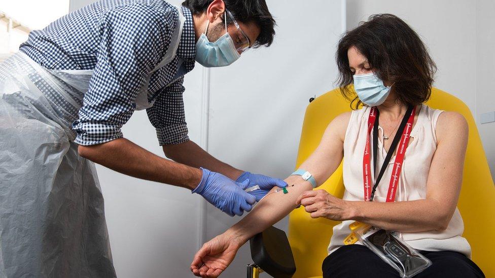 Woman getting coronavirus vaccine