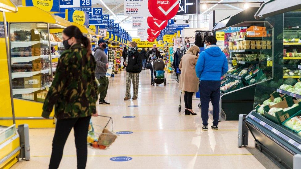 People in a supermarket in January