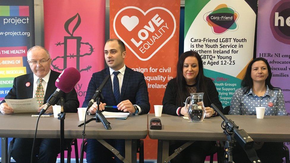 Reverend Chris Hudson, solicitor Ciaran Moynagh and same-sex couple Cara McCann and Amanda McGurk at a press conference about their legal action