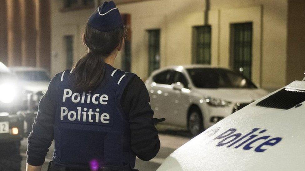 A policewoman during an operation in Brussels on 25 August 2017