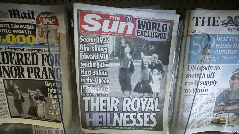 Front page of the Sun reads "Their Royal Heilnesses" and shows picture of Queen as girl doing Hitler salute