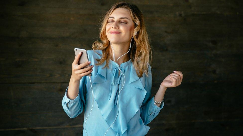 Woman listening to radio