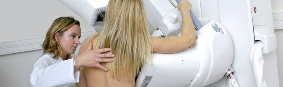 Woman having a mammogram