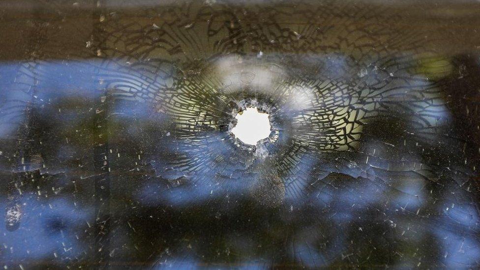 A general view of the car with bullet holes is parked at a police station in Kajiado, Kenya, 25 October 2022