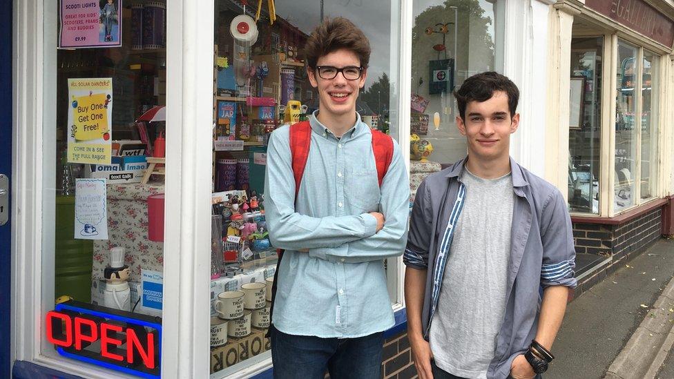 Ethan (left) and Will outside a shop