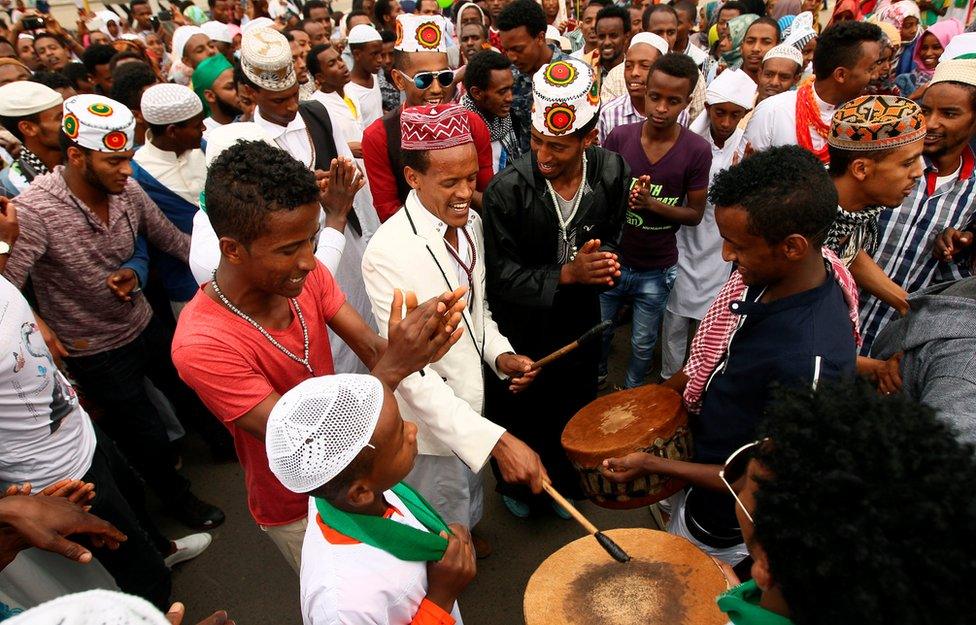 Muslim men sing after attending Eid al-Fitr prayers to mark the end of the holy fasting month of Ramadan in Addis Ababa, Ethiopia July 6