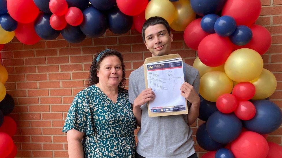 Adam with his mum Michelle