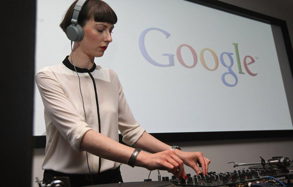 A DJ plays music at the official opening party of the Google offices in Berlin, Germany