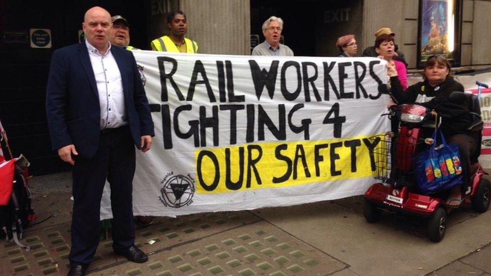 Disability campaigners from Disabled People Against the Cuts (DPAC) join RMT Southern guards picket line at Victoria