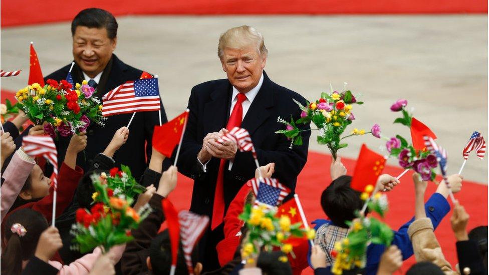 Chinese President Xi Jinping and U.S. President Donald Trump attend a welcoming ceremony November 9, 2017