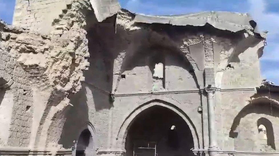 A still from a verified video showing extensive damage to the Great Omari Mosque in Gaza City