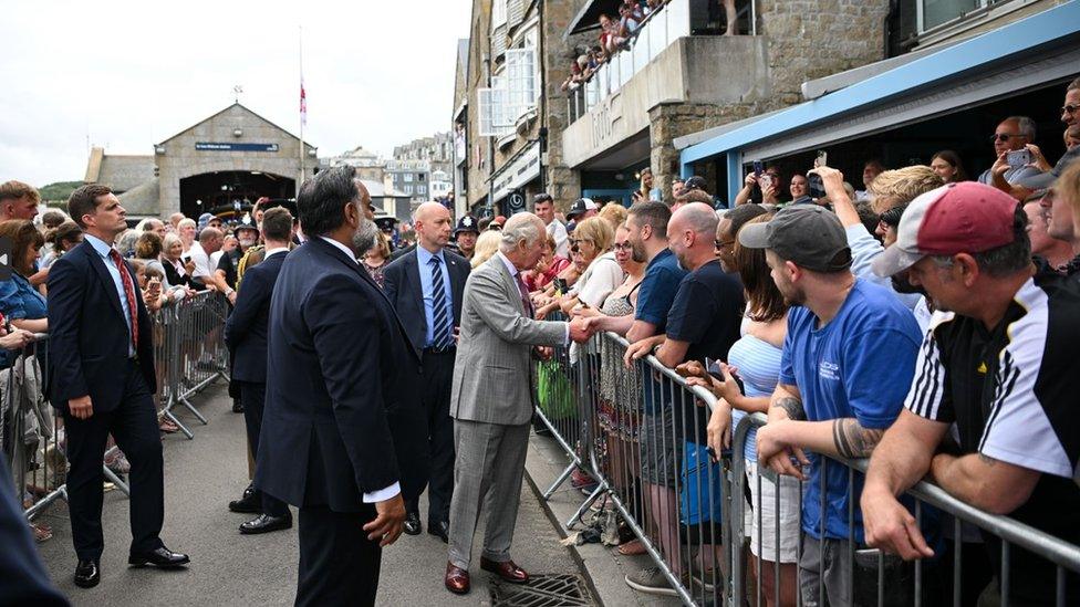 King Charles III meets members of the public during a visit to St Ives Harbour, Cornwall, to meet members of the Cornish community. Picture date: Thursday July 13, 2023