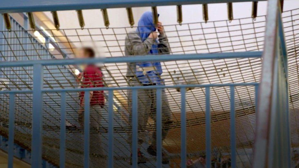 Prisoners occupied an area of protective netting.