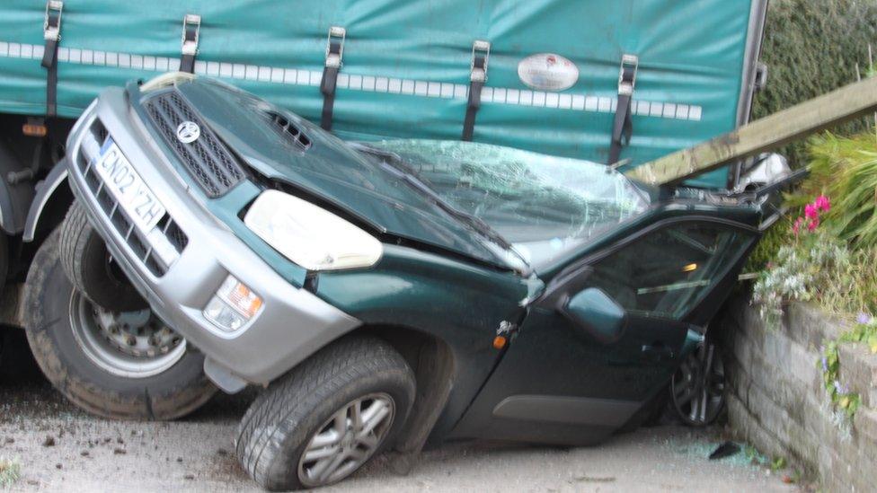 Mr Sharpe's car written off by lorry