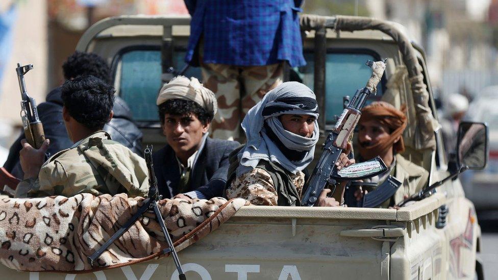 Rebel Houthi fighters sit in a vehicle in Sanaa, Yemen (4 December 2017)