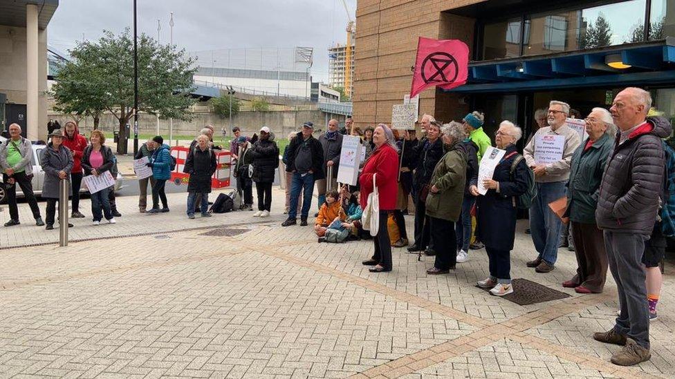 A crowd protesting against bus cuts in Sheffield on Tuesday