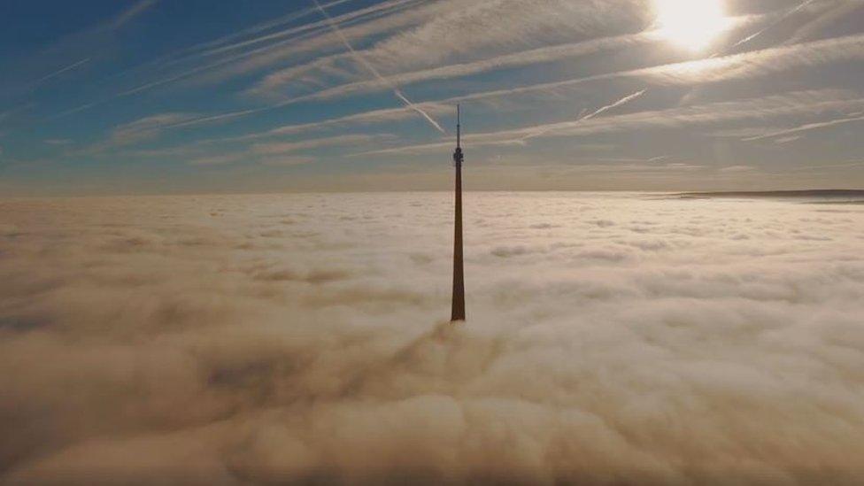 Top of Emley Moor Mast above cloud