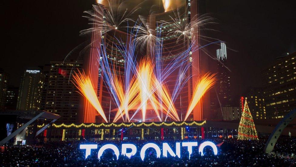 Fireworks go off to mark the beginning 2016 during New Year"s celebrations held at Nathan Phillips Square in Toronto