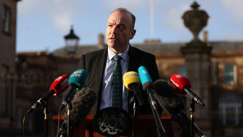 Northern Ireland Secretary Chris Heaton-Harris speaks to the media outside Hillsborough Castle